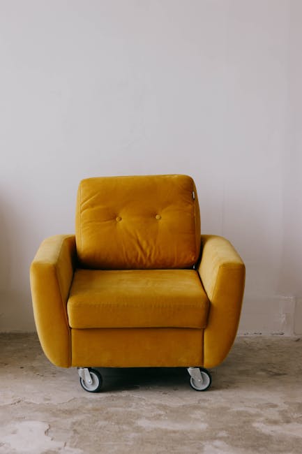 Close-up view of a beige fabric sofa in a living room, showcasing the tufted cushions and smooth upholstery with minimal visible stains, indicating recent surface cleaning and sanitisation by Bow Carp